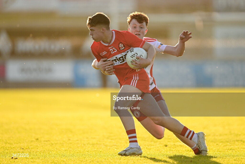 29 May 2026; Cahair McDonnell of Derry in action against Brian Óg McGuckin of Tyrone during the Electric Ireland Ulster GAA Football Minor Championship final match between Derry and Tyrone at O'Donnell Park in Letterkenny, Donegal. Photo by Ramsey Cardy/Sportsfile