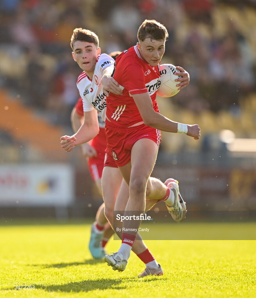 29 May 2026; Neil McDermott of Derry in action against Matthew J Daly of Tyrone during the Electric Ireland Ulster GAA Football Minor Championship final match between Derry and Tyrone at O'Donnell Park in Letterkenny, Donegal. Photo by Ramsey Cardy/Sportsfile