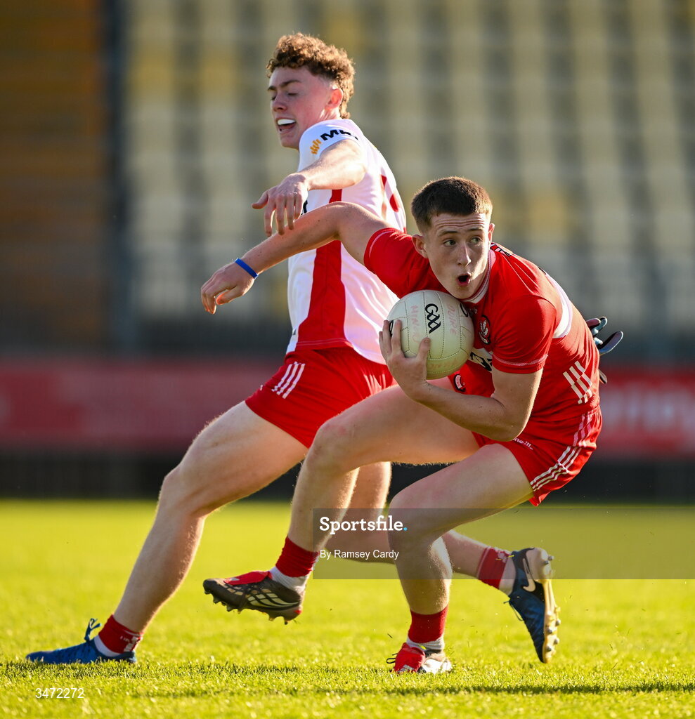 29 May 2026; Jarlath McCartney of Derry in action against Ruairi O'Neill of Tyrone during the Electric Ireland Ulster GAA Football Minor Championship final match between Derry and Tyrone at O'Donnell Park in Letterkenny, Donegal. Photo by Ramsey Cardy/Sportsfile