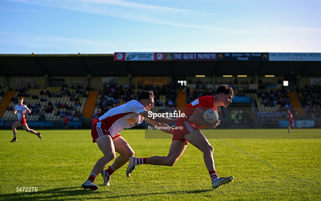 29 May 2026; Don Mulholland of Derry in action against James Maguire of Tyrone during the Electric Ireland Ulster GAA Football Minor Championship final match between Derry and Tyrone at O'Donnell Park in Letterkenny, Donegal. Photo by Ramsey Cardy/Sportsfile