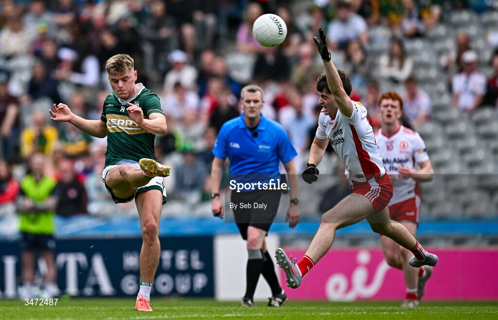 30 May 2026; Daniel Kirby of Kerry kicks a point, under pressure from Tyrone's Brian Gallagher, during the Dalata Hotels Group GAA Football All-Ireland U20 Championship final match between Kerry and Tyrone at Croke Park in Dublin. Photo by Seb Daly/Sportsfile