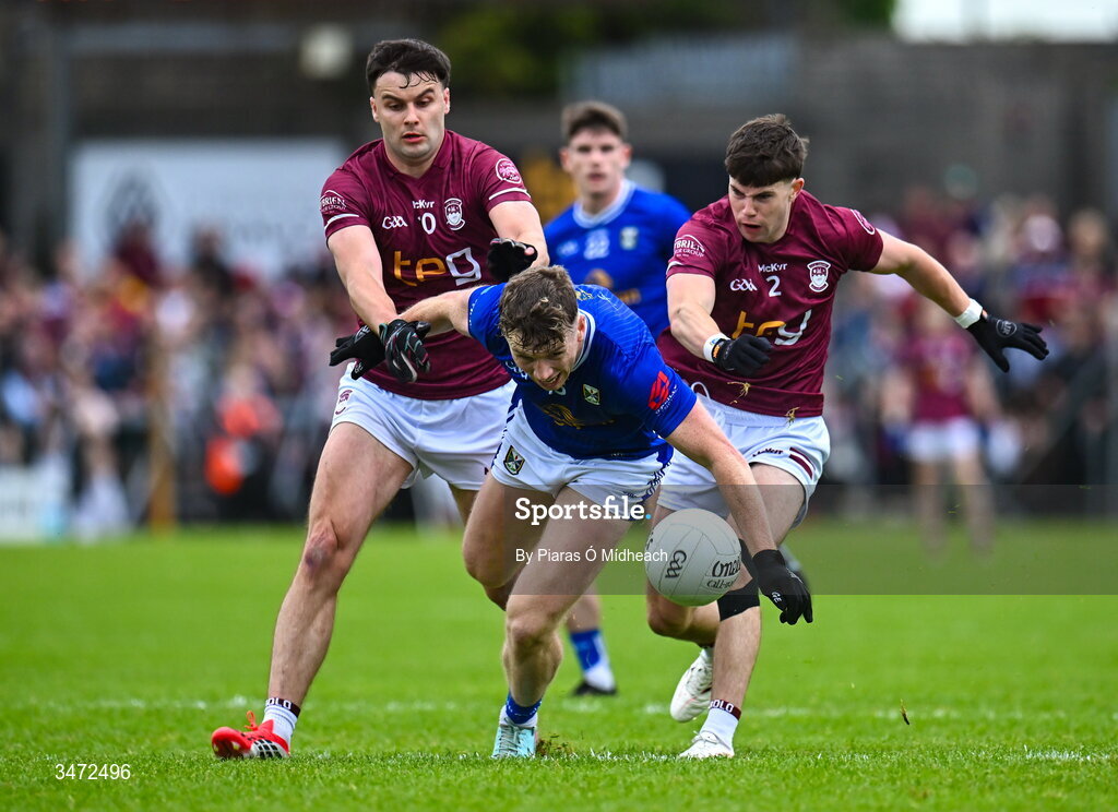 30 May 2026; Patrick Lynch of Cavan in action against Kevin O'Sullivan, left, and Daniel Scahill of Westmeath during the GAA Football All-Ireland Senior Championship Round 1 match between Westmeath and Cavan at TEG Cusack Park in Mullingar, Westmeath. Photo by Piaras Ó Mídheach/Sportsfile