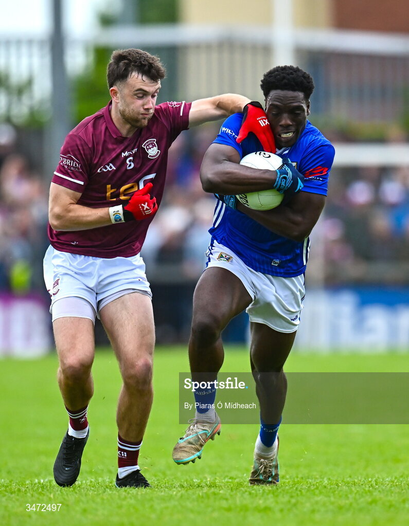 30 May 2026; Emmanuel Shehu of Cavan in action against Brían Cooney of Westmeath during the GAA Football All-Ireland Senior Championship Round 1 match between Westmeath and Cavan at TEG Cusack Park in Mullingar, Westmeath. Photo by Piaras Ó Mídheach/Sportsfile