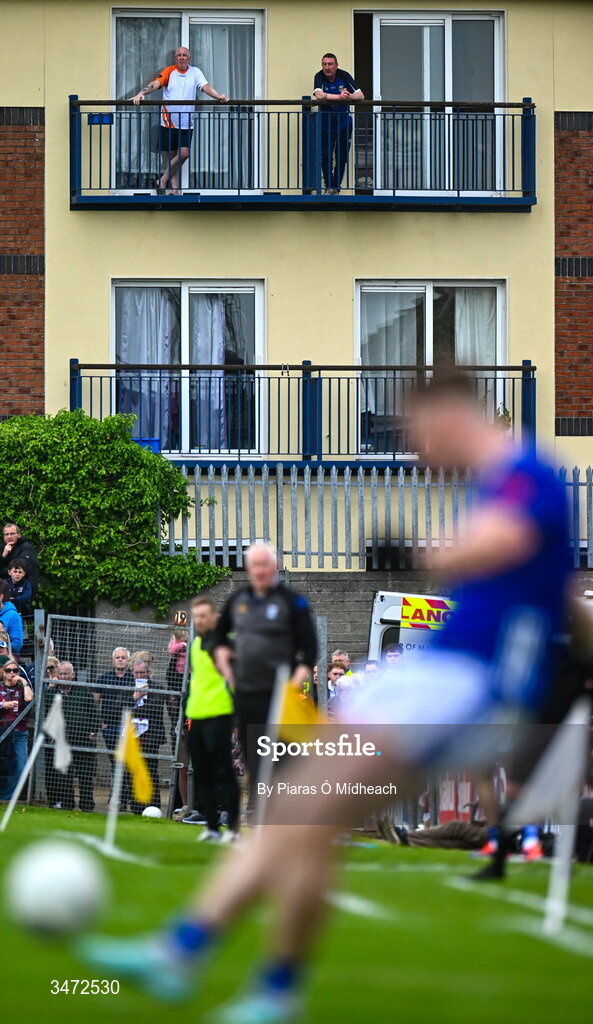 30 May 2026; Two men in a nearby apartment look on during the GAA Football All-Ireland Senior Championship Round 1 match between Westmeath and Cavan at TEG Cusack Park in Mullingar, Westmeath. Photo by Piaras Ó Mídheach/Sportsfile