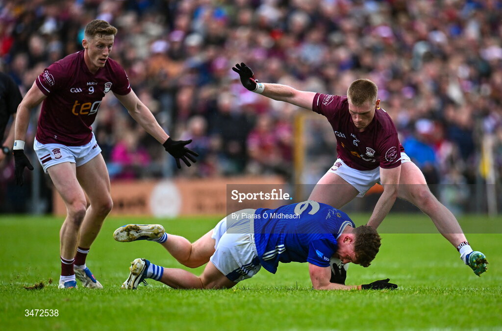 30 May 2026; Ciarán Brady of Cavan in action against Shane Allen, right, and Ray Connellan of Westmeath during the GAA Football All-Ireland Senior Championship Round 1 match between Westmeath and Cavan at TEG Cusack Park in Mullingar, Westmeath. Photo by Piaras Ó Mídheach/Sportsfile