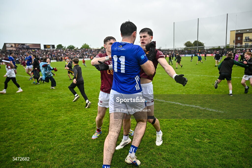 30 May 2026; Westmeath players Shane Corcoran, left, and Daniel Scahill and Ryan Donohoe of Cavan tussle after the match at the GAA Football All-Ireland Senior Championship Round 1 match between Westmeath and Cavan at TEG Cusack Park in Mullingar, Westmeath. Photo by Piaras Ó Mídheach/Sportsfile