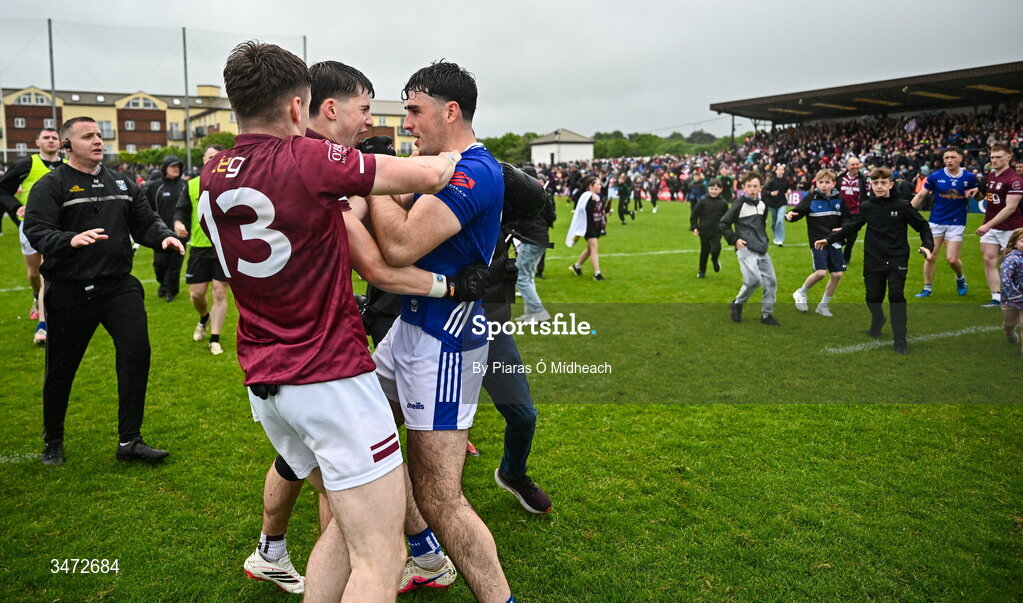 30 May 2026; Westmeath players Shane Corcoran, left, and Daniel Scahill and Ryan Donohoe of Cavan tussle after the match at the GAA Football All-Ireland Senior Championship Round 1 match between Westmeath and Cavan at TEG Cusack Park in Mullingar, Westmeath. Photo by Piaras Ó Mídheach/Sportsfile