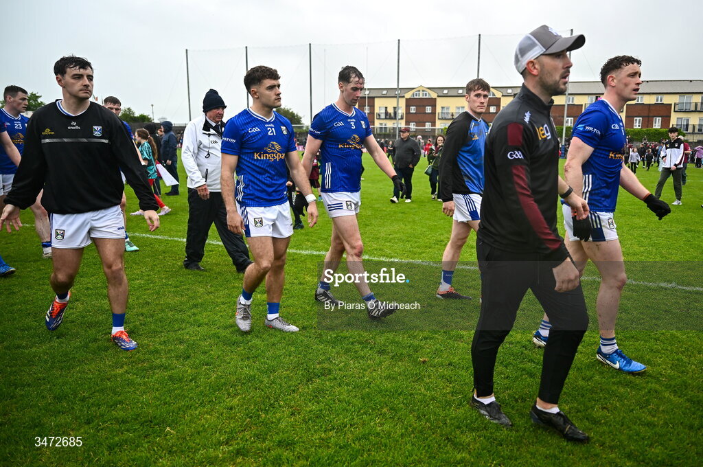 30 May 2026; Cavan players and Westmeath manager Mark McHugh walk off the pitch after the GAA Football All-Ireland Senior Championship Round 1 match between Westmeath and Cavan at TEG Cusack Park in Mullingar, Westmeath. Photo by Piaras Ó Mídheach/Sportsfile