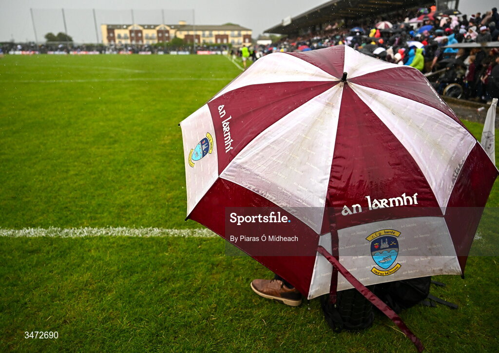 30 May 2026; A Westmeath photographer battles the rain during the GAA Football All-Ireland Senior Championship Round 1 match between Westmeath and Cavan at TEG Cusack Park in Mullingar, Westmeath. Photo by Piaras Ó Mídheach/Sportsfile
