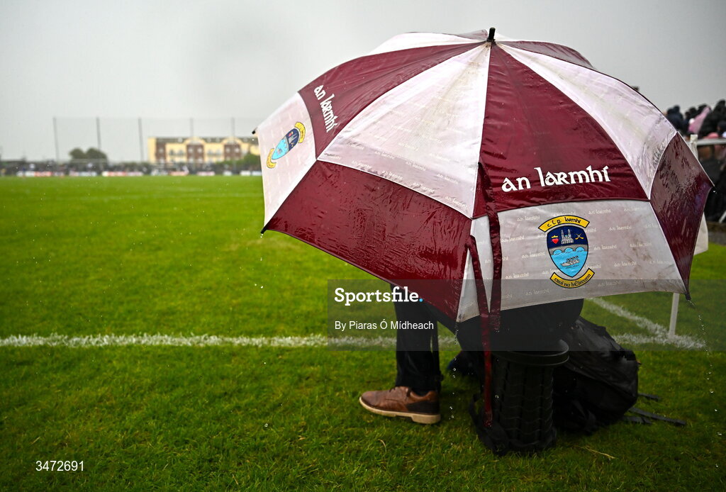 30 May 2026; A Westmeath photographer battles the rain during the GAA Football All-Ireland Senior Championship Round 1 match between Westmeath and Cavan at TEG Cusack Park in Mullingar, Westmeath. Photo by Piaras Ó Mídheach/Sportsfile