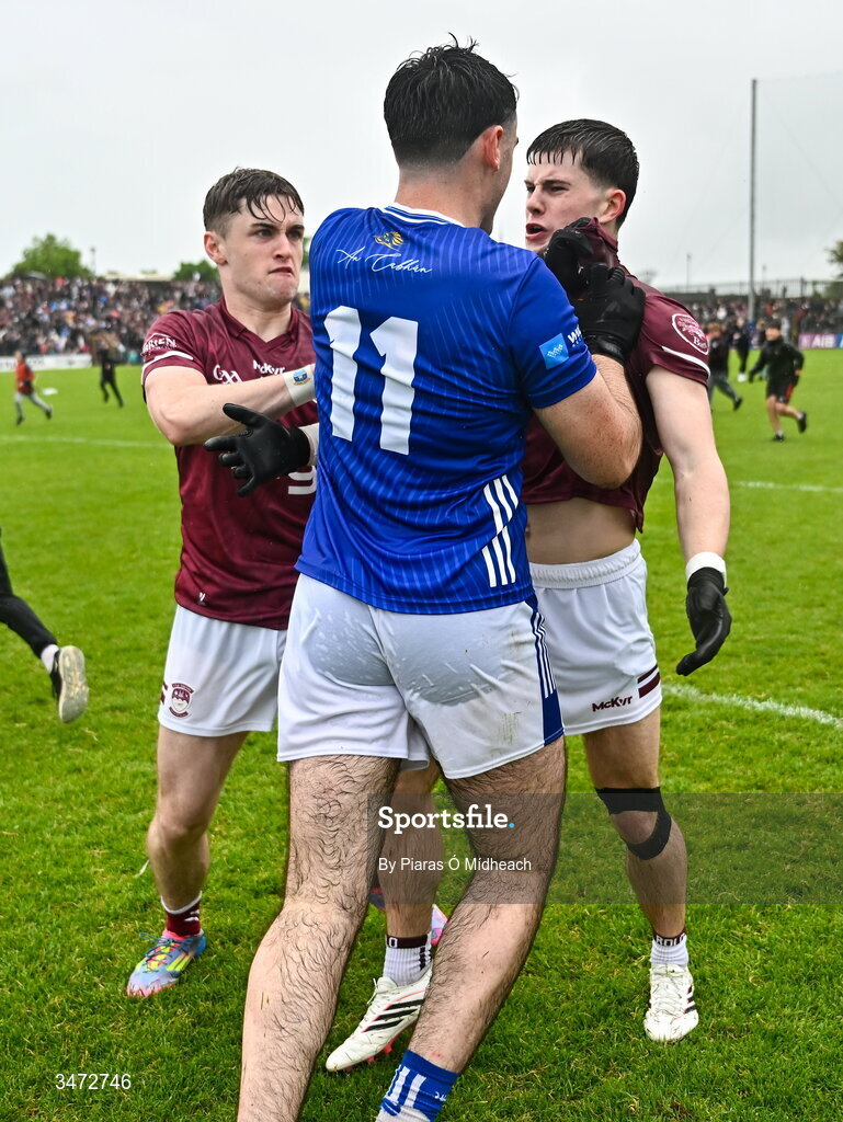 30 May 2026; Westmeath players Shane Corcoran, left, and Daniel Scahill and Ryan Donohoe of Cavan tussle after the match at the GAA Football All-Ireland Senior Championship Round 1 match between Westmeath and Cavan at TEG Cusack Park in Mullingar, Westmeath. Photo by Piaras Ó Mídheach/Sportsfile