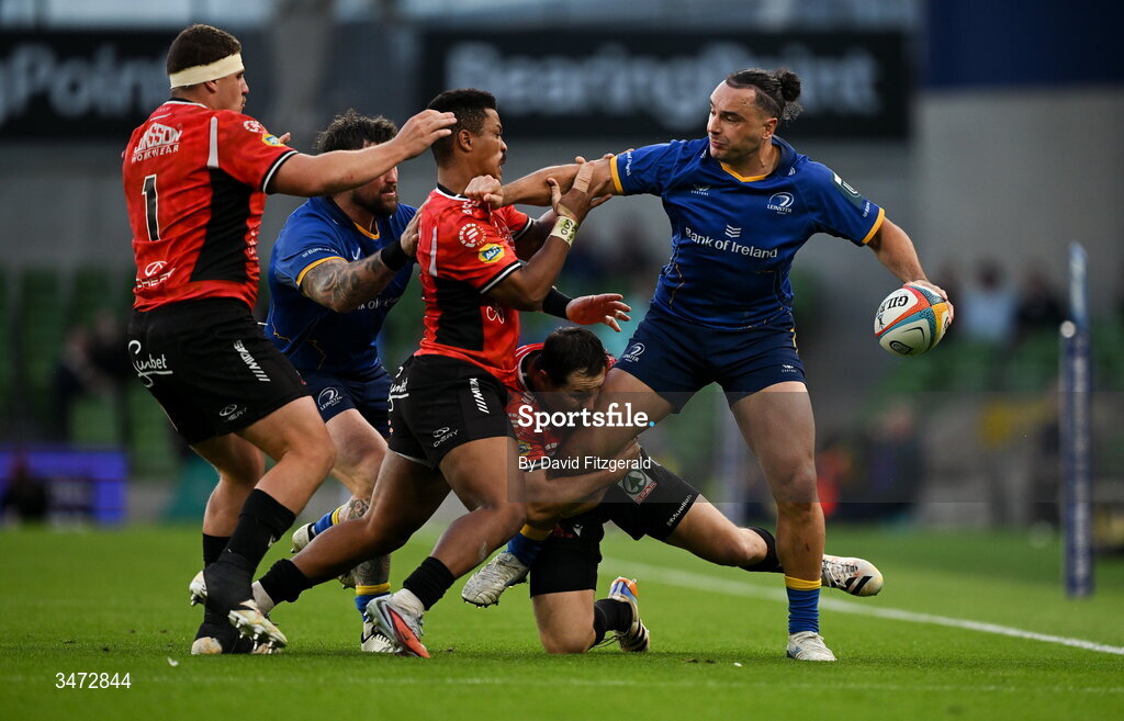 30 May 2026; James Lowe of Leinster is tackled by Richard Kriel, bottom, Angelo Davids and SJ Kotze of Lions during the United Rugby Championship quarter-final match between Leinster and Lions at the Aviva Stadium in Dublin. Photo by David Fitzgerald/Sportsfile