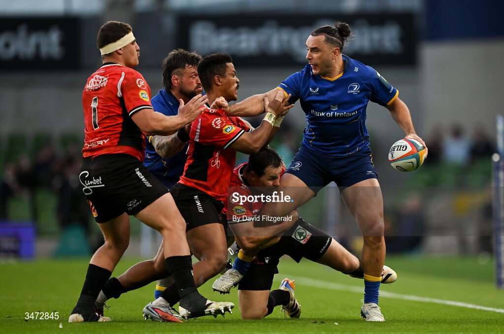 30 May 2026; James Lowe of Leinster is tackled by Angelo Davids, centre, Richard Kriel, centre, and SJ Kotze of Lions during the United Rugby Championship quarter-final match between Leinster and Lions at the Aviva Stadium in Dublin. Photo by David Fitzgerald/Sportsfile