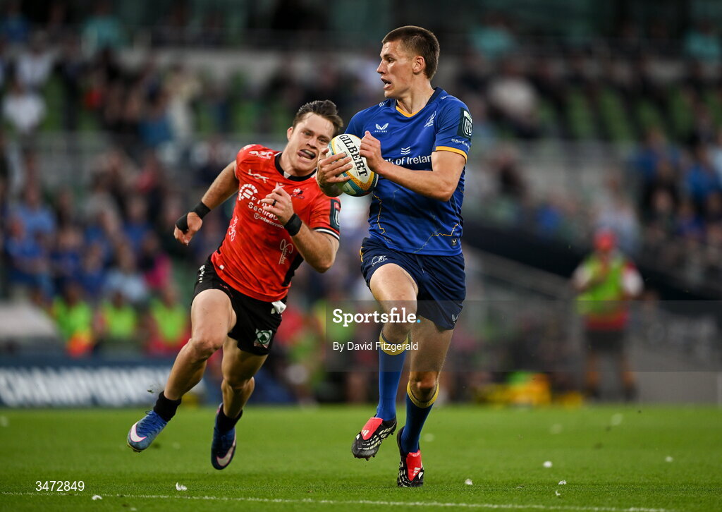 30 May 2026; Sam Prendergast of Leinster on his way to scoring his side's fifth try despite the efforts of Quan Horn of Lions during the United Rugby Championship quarter-final match between Leinster and Lions at the Aviva Stadium in Dublin. Photo by David Fitzgerald/Sportsfile