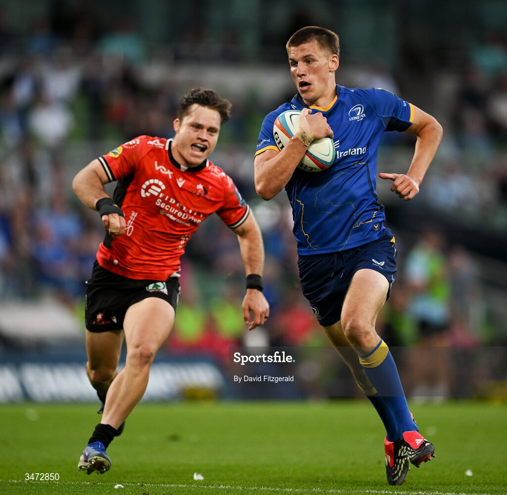 30 May 2026; Sam Prendergast of Leinster on his way to scoring his side's fifth try despite the efforts of Quan Horn of Lions during the United Rugby Championship quarter-final match between Leinster and Lions at the Aviva Stadium in Dublin. Photo by David Fitzgerald/Sportsfile