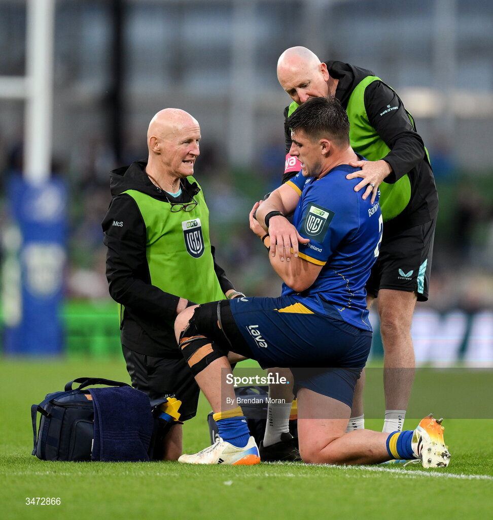 30 May 2026; Dan Sheehan of Leinster recieves medical attention from Leinster team doctor and exercise medicine consultant Dr Jim McShane, left, and Leinster head physiotherapist Garreth Farrell during the United Rugby Championship quarter-final match between Leinster and Lions at the Aviva Stadium in Dublin. Photo by Brendan Moran/Sportsfile