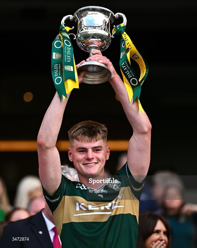 30 May 2026; Kerry's Daniel Kirby lifts the Clarke Cup after his side's victory in the Dalata Hotels Group GAA Football All-Ireland U20 Championship final match between Kerry and Tyrone at Croke Park in Dublin. Photo by Seb Daly/Sportsfile