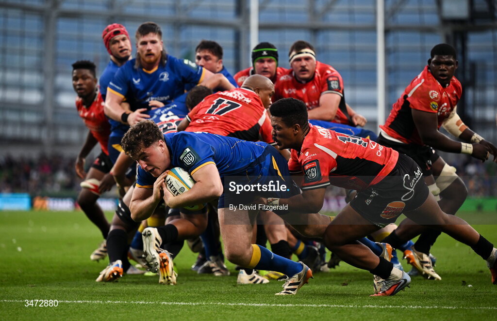 30 May 2026; Gus McCarthy of Leinster dives over to score his side's sixth try despite the efforts of Angelo Davids of Lions during the United Rugby Championship quarter-final match between Leinster and Lions at the Aviva Stadium in Dublin. Photo by David Fitzgerald/Sportsfile
