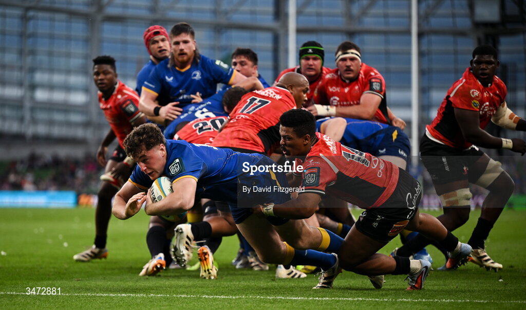 30 May 2026; Gus McCarthy of Leinster dives over to score his side's sixth try despite the efforts of Angelo Davids of Lions during the United Rugby Championship quarter-final match between Leinster and Lions at the Aviva Stadium in Dublin. Photo by David Fitzgerald/Sportsfile