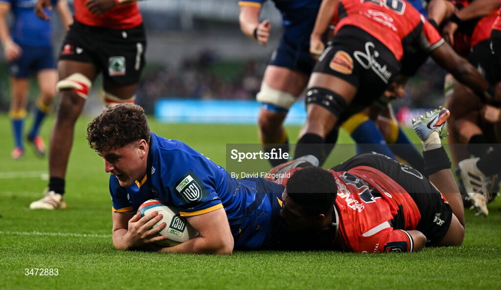 30 May 2026; Gus McCarthy of Leinster dives over to score his side's sixth try despite the efforts of Angelo Davids of Lions during the United Rugby Championship quarter-final match between Leinster and Lions at the Aviva Stadium in Dublin. Photo by David Fitzgerald/Sportsfile
