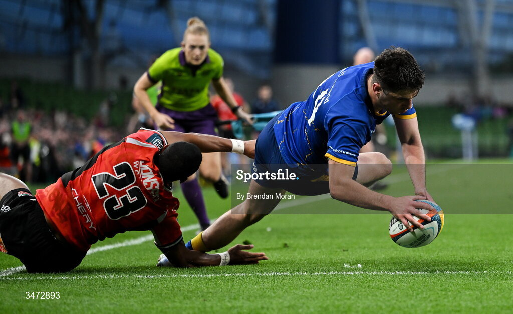 30 May 2026; Jimmy O'Brien of Leinster dives over to score his side's seventh try despite the tackle of Haashim Pead of Lions during the United Rugby Championship quarter-final match between Leinster and Lions at the Aviva Stadium in Dublin. Photo by Brendan Moran/Sportsfile