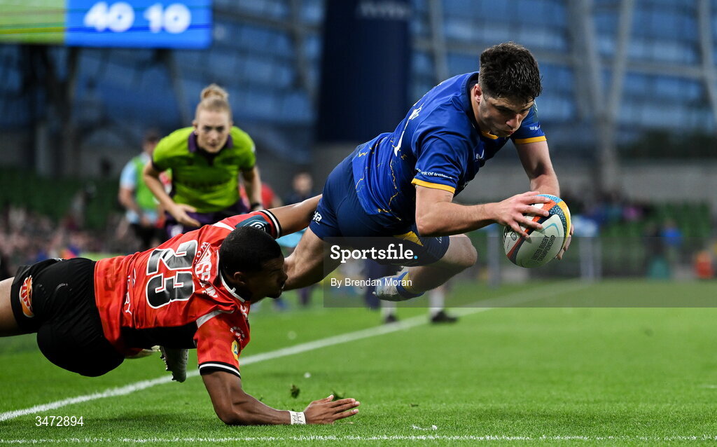 30 May 2026; Jimmy O'Brien of Leinster dives over to score his side's seventh try despite the tackle of Haashim Pead of Lions during the United Rugby Championship quarter-final match between Leinster and Lions at the Aviva Stadium in Dublin. Photo by Brendan Moran/Sportsfile
