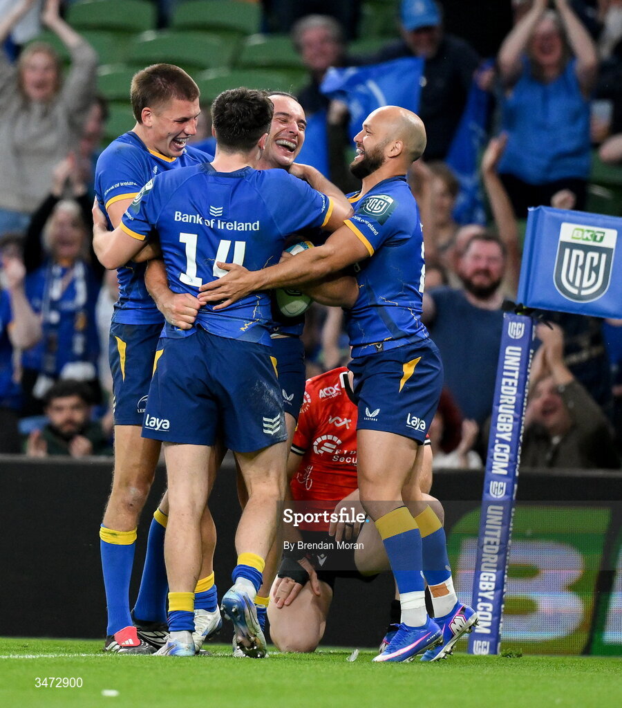 30 May 2026; James Lowe of Leinster, second from right, celebrates with teammates, from left, Sam Prendergast, Jimmy O'Brien and Jamison Gibson-Park after scoring their side's eighth try and becoming the new Leinster record try scorer during the United Rugby Championship quarter-final match between Leinster and Lions at the Aviva Stadium in Dublin. Photo by Brendan Moran/Sportsfile