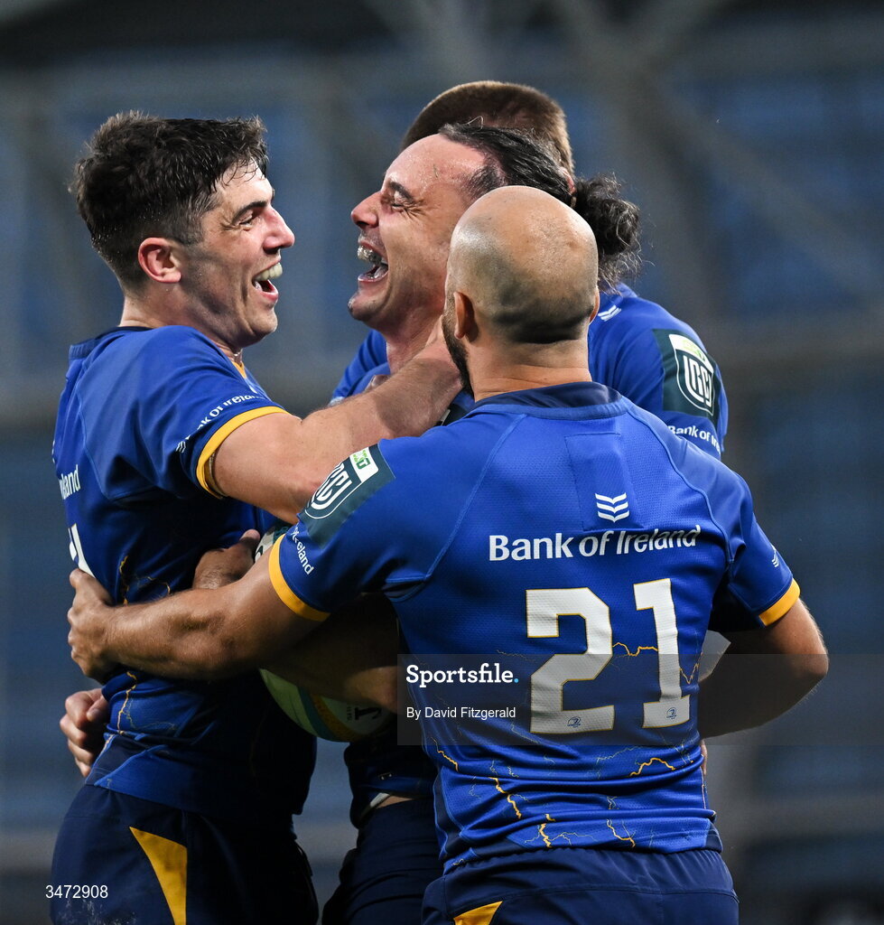 30 May 2026; James Lowe of Leinster, centre, celebrates with teammates, Jimmy O'Brien, left, and Jamison Gibson-Park after scoring their side's eighth try and becoming the new Leinster record try scorer during the United Rugby Championship quarter-final match between Leinster and Lions at the Aviva Stadium in Dublin. Photo by David Fitzgerald/Sportsfile
