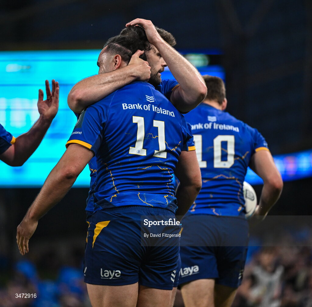 30 May 2026; James Lowe of Leinster, 11, celebrates with teammate Harry Byrne after scoring their side's ninth try during the United Rugby Championship quarter-final match between Leinster and Lions at the Aviva Stadium in Dublin. Photo by David Fitzgerald/Sportsfile