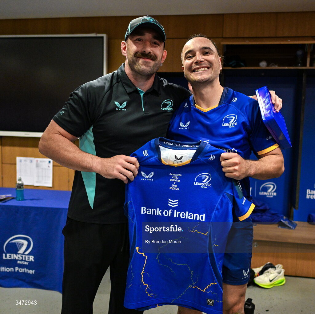 30 May 2026; James Lowe of Leinster, right, is presented with a jersey to mark his 100th cap by team-mate Jack Conan after the United Rugby Championship quarter-final match between Leinster and Lions at the Aviva Stadium in Dublin. Photo by Brendan Moran/Sportsfile