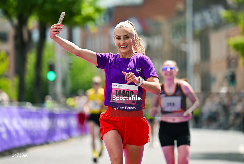31 May 2026; VHI ambassador Nathalie Lennon crosses the line during the 2026 Vhi Women’s Mini Marathon. Almost 30,000 women from all over the country took to the streets of Dublin to run, walk and jog the 10km route, raising much needed funds for hundreds of charities around the country. www.vhiwomensminimarathon.ie. Photo by Sam Barnes/Sportsfile
