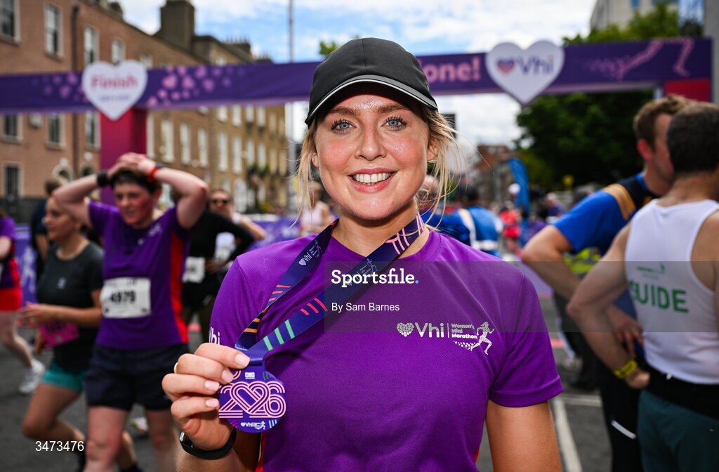 31 May 2026; VHI ambassador Aimee Connolly celebrates with her medal after the 2026 Vhi Women’s Mini Marathon. Almost 30,000 women from all over the country took to the streets of Dublin to run, walk and jog the 10km route, raising much needed funds for hundreds of charities around the country. www.vhiwomensminimarathon.ie. Photo by Sam Barnes/Sportsfile