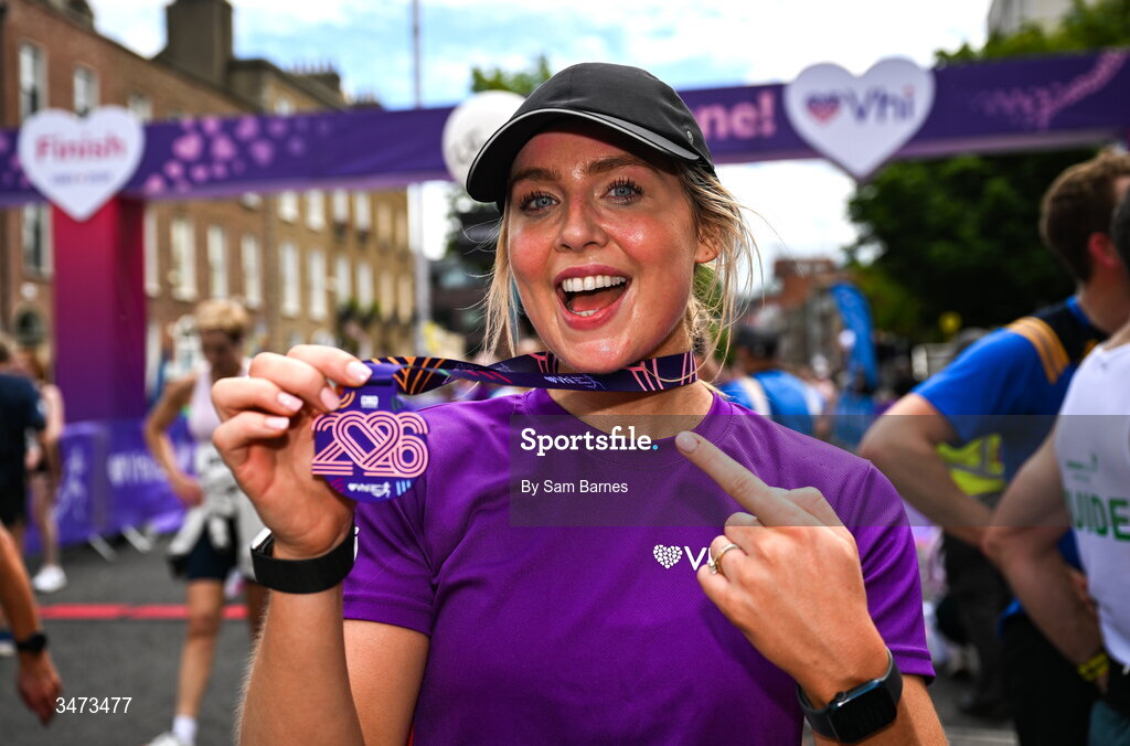 31 May 2026; VHI ambassador Aimee Connolly celebrates with her medal after the 2026 Vhi Women’s Mini Marathon. Almost 30,000 women from all over the country took to the streets of Dublin to run, walk and jog the 10km route, raising much needed funds for hundreds of charities around the country. www.vhiwomensminimarathon.ie. Photo by Sam Barnes/Sportsfile