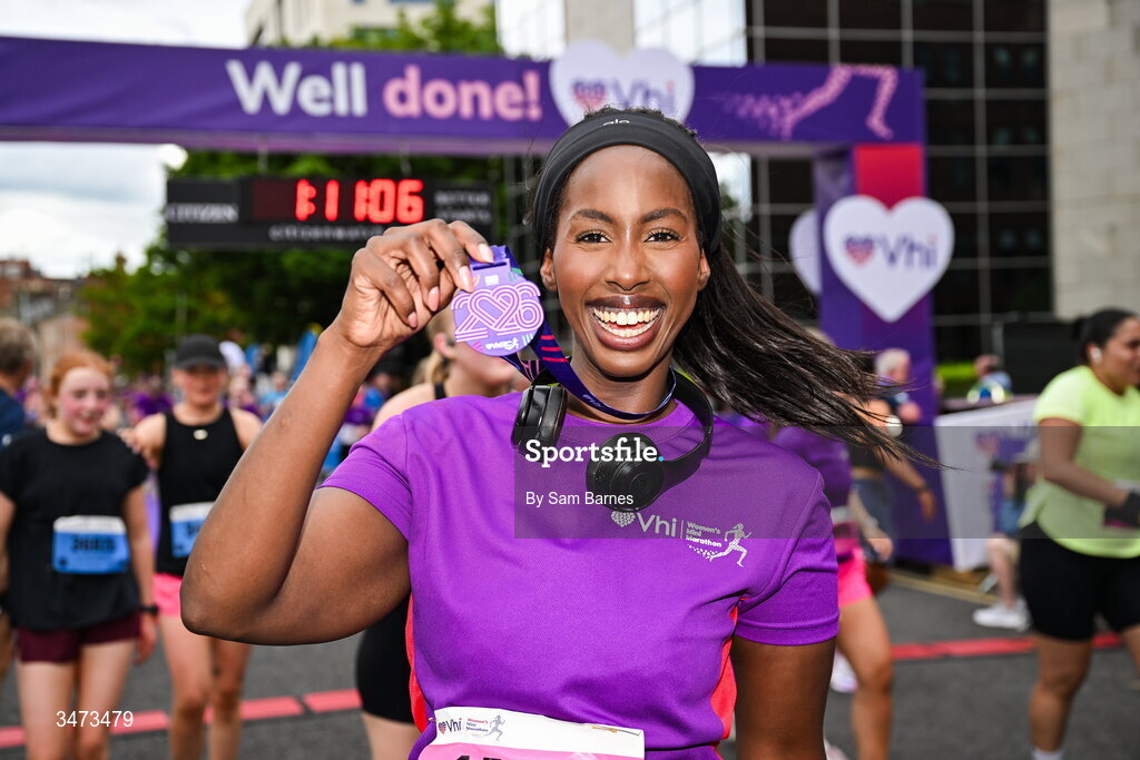 31 May 2026; VHI ambassador Katja Mia celebrates with her medal after the 2026 Vhi Women’s Mini Marathon. Almost 30,000 women from all over the country took to the streets of Dublin to run, walk and jog the 10km route, raising much needed funds for hundreds of charities around the country. www.vhiwomensminimarathon.ie. Photo by Sam Barnes/Sportsfile