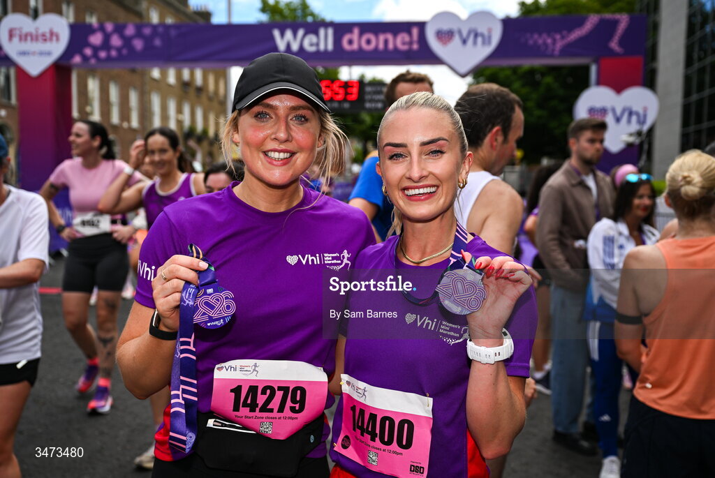 31 May 2026; VHI ambassadors Aimee Connolly, left, and Nathalie Lennon celebrate with their medals after the 2026 Vhi Women’s Mini Marathon. Almost 30,000 women from all over the country took to the streets of Dublin to run, walk and jog the 10km route, raising much needed funds for hundreds of charities around the country. www.vhiwomensminimarathon.ie. Photo by Sam Barnes/Sportsfile