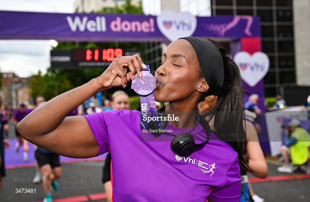 31 May 2026; VHI ambassador Katja Mia celebrates with her medal after the 2026 Vhi Women’s Mini Marathon. Almost 30,000 women from all over the country took to the streets of Dublin to run, walk and jog the 10km route, raising much needed funds for hundreds of charities around the country. www.vhiwomensminimarathon.ie. Photo by Sam Barnes/Sportsfile