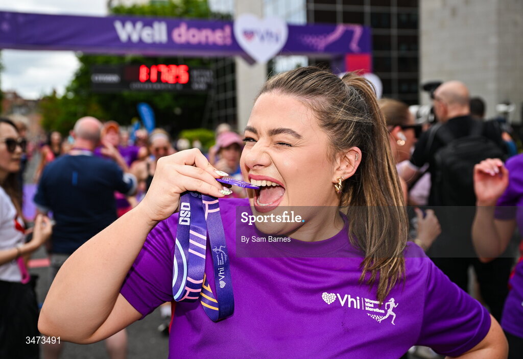 31 May 2026; VHI ambassador Clóda Scanlon celebrates with her medal after the 2026 Vhi Women’s Mini Marathon. Almost 30,000 women from all over the country took to the streets of Dublin to run, walk and jog the 10km route, raising much needed funds for hundreds of charities around the country. www.vhiwomensminimarathon.ie. Photo by Sam Barnes/Sportsfile