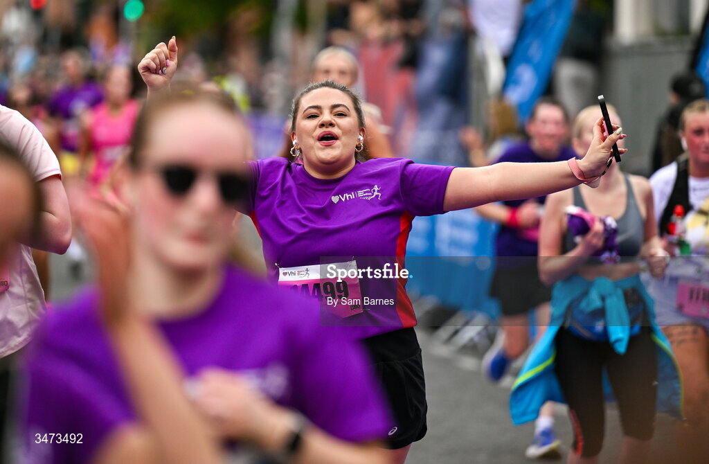 31 May 2026; VHI ambassador Clóda Scanlon crosses the line during the 2026 Vhi Women’s Mini Marathon. Almost 30,000 women from all over the country took to the streets of Dublin to run, walk and jog the 10km route, raising much needed funds for hundreds of charities around the country. www.vhiwomensminimarathon.ie. Photo by Sam Barnes/Sportsfile