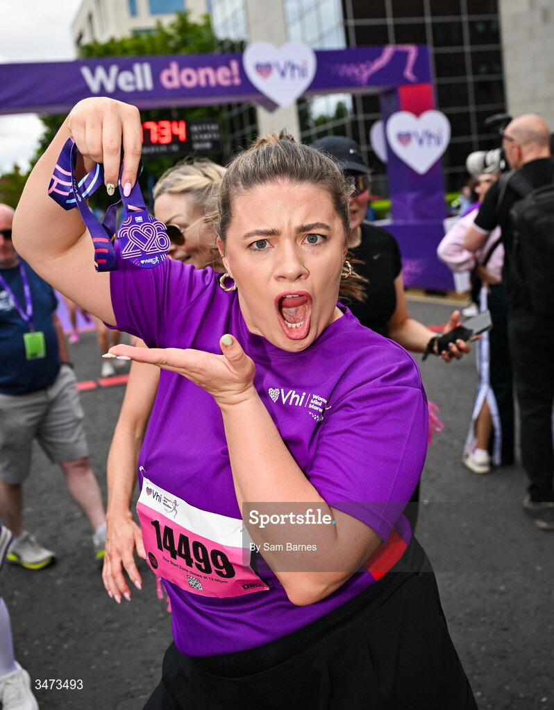 31 May 2026; VHI ambassador Clóda Scanlon celebrates with her medal after the 2026 Vhi Women’s Mini Marathon. Almost 30,000 women from all over the country took to the streets of Dublin to run, walk and jog the 10km route, raising much needed funds for hundreds of charities around the country. www.vhiwomensminimarathon.ie. Photo by Sam Barnes/Sportsfile