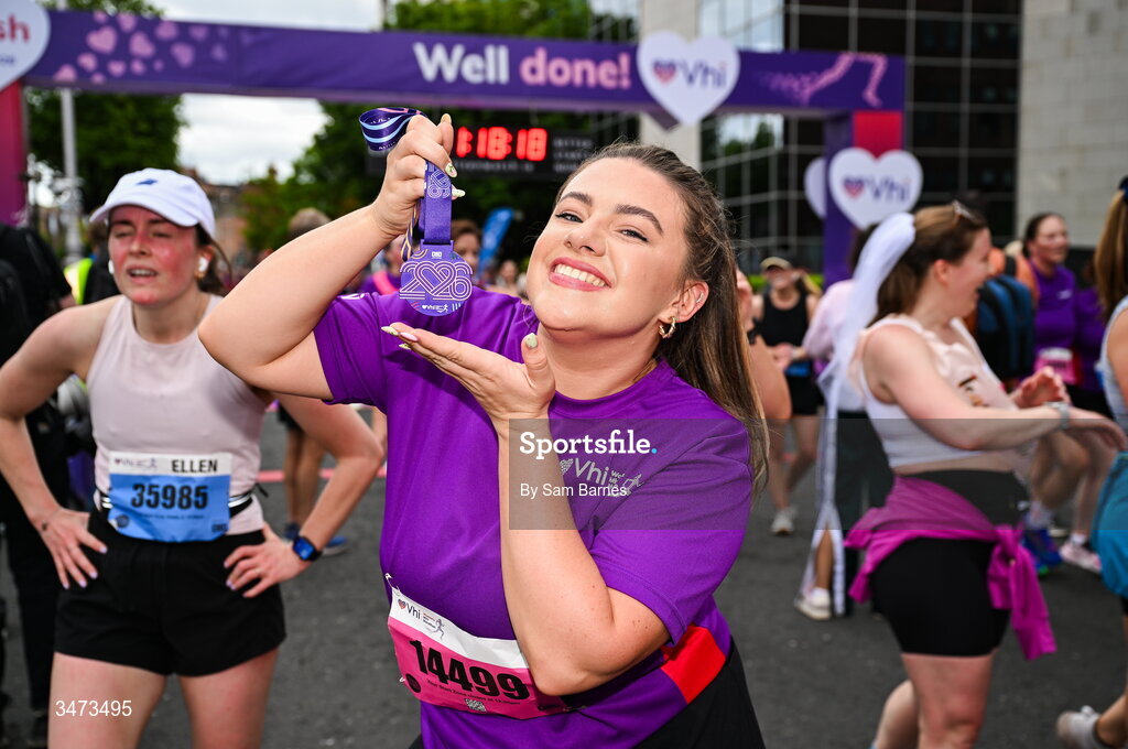 31 May 2026; VHI ambassador Clóda Scanlon celebrates with her medal after the 2026 Vhi Women’s Mini Marathon. Almost 30,000 women from all over the country took to the streets of Dublin to run, walk and jog the 10km route, raising much needed funds for hundreds of charities around the country. www.vhiwomensminimarathon.ie. Photo by Sam Barnes/Sportsfile