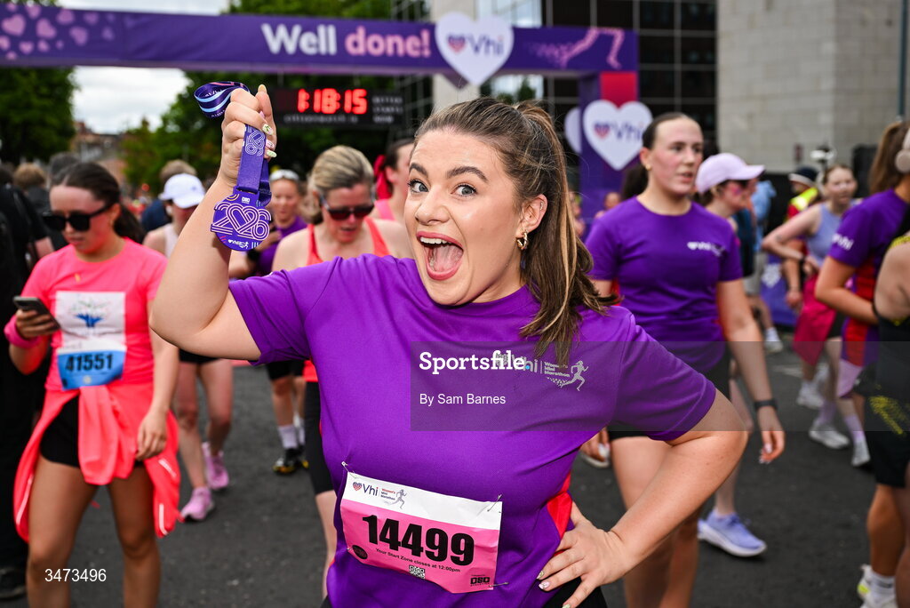 31 May 2026; VHI ambassador Clóda Scanlon celebrates with her medal after the 2026 Vhi Women’s Mini Marathon. Almost 30,000 women from all over the country took to the streets of Dublin to run, walk and jog the 10km route, raising much needed funds for hundreds of charities around the country. www.vhiwomensminimarathon.ie. Photo by Sam Barnes/Sportsfile