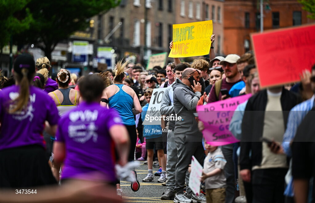 31 May 2026; Supporters encourage the participants during the 2026 Vhi Women’s Mini Marathon. Almost 30,000 women from all over the country took to the streets of Dublin to run, walk and jog the 10km route, raising much needed funds for hundreds of charities around the country. www.vhiwomensminimarathon.ie. Photo by Tyler Miller/Sportsfile