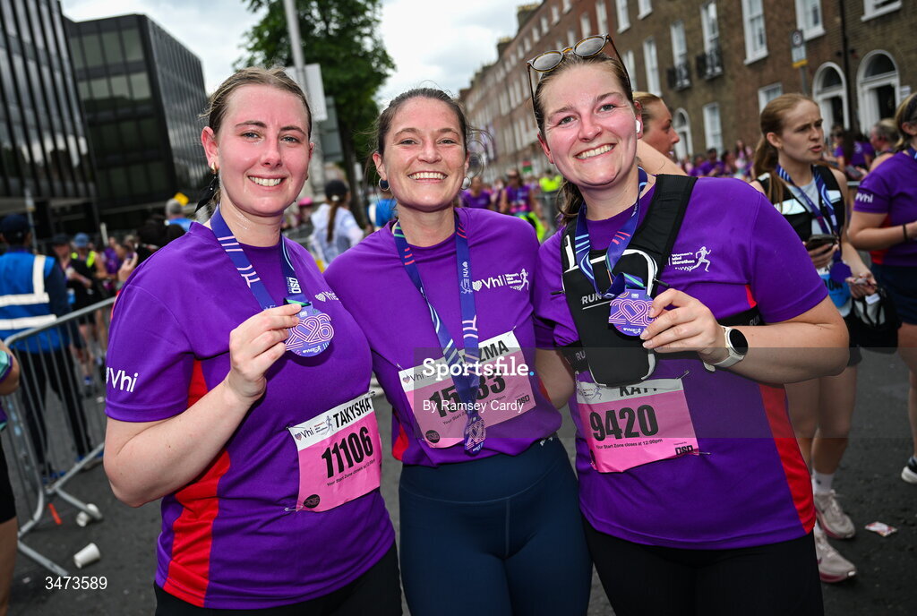 31 May 2026; Participants with their medals after the 2026 Vhi Women’s Mini Marathon. Almost 30,000 women from all over the country took to the streets of Dublin to run, walk and jog the 10km route, raising much needed funds for hundreds of charities around the country. www.vhiwomensminimarathon.ie. Photo by Ramsey Cardy/Sportsfile