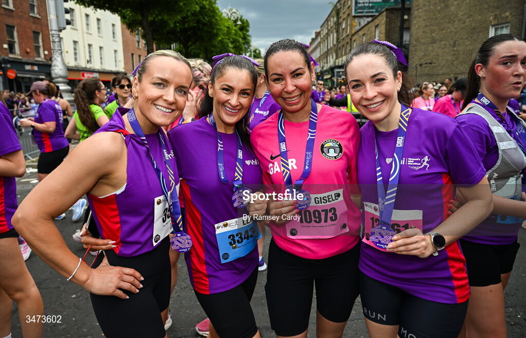 31 May 2026; Participants with their medals after the 2026 Vhi Women’s Mini Marathon. Almost 30,000 women from all over the country took to the streets of Dublin to run, walk and jog the 10km route, raising much needed funds for hundreds of charities around the country. www.vhiwomensminimarathon.ie. Photo by Ramsey Cardy/Sportsfile