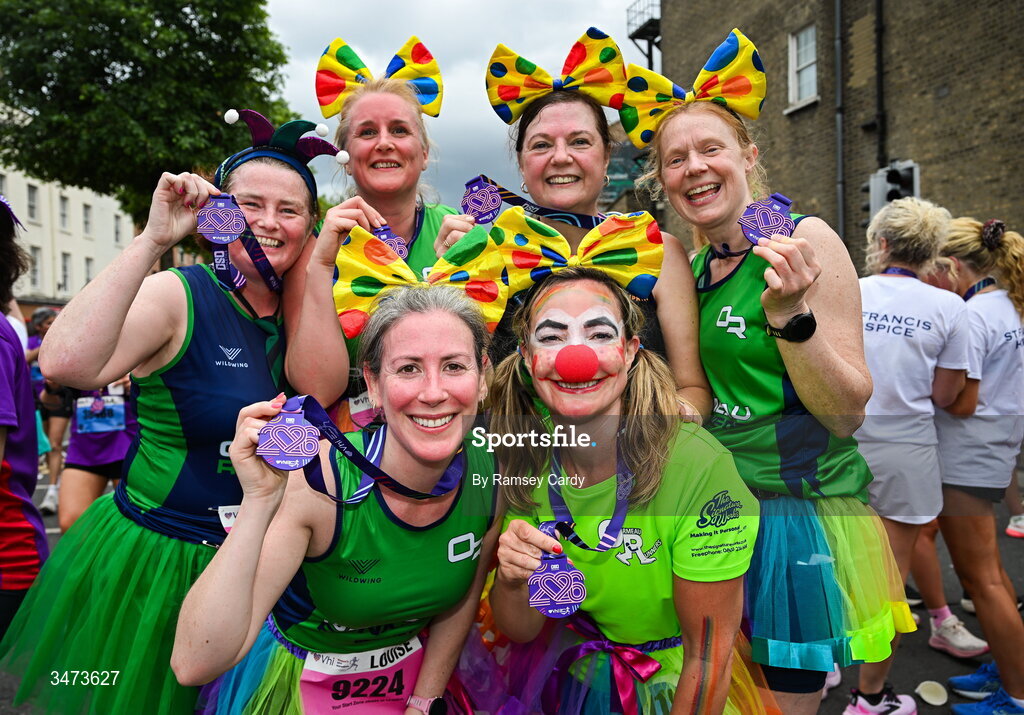31 May 2026; Participants from Ormeau Runners, Belfast, with their medals after the 2026 Vhi Women’s Mini Marathon. Almost 30,000 women from all over the country took to the streets of Dublin to run, walk and jog the 10km route, raising much needed funds for hundreds of charities around the country. www.vhiwomensminimarathon.ie. Photo by Ramsey Cardy/Sportsfile