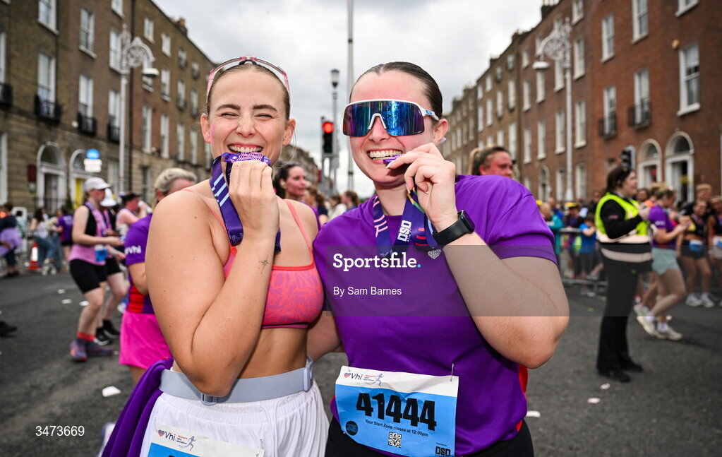 31 May 2026; Emily, left, and Lucy McNamara from Malahide, Dublin, with their medals after the 2026 Vhi Women’s Mini Marathon. Almost 30,000 women from all over the country took to the streets of Dublin to run, walk and jog the 10km route, raising much needed funds for hundreds of charities around the country. www.vhiwomensminimarathon.ie. Photo by Sam Barnes/Sportsfile
