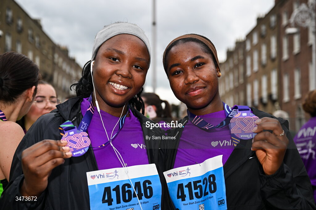 31 May 2026; Gizelle Gurrowju, left, and Bana Olawoye with their medals after the 2026 Vhi Women’s Mini Marathon. Almost 30,000 women from all over the country took to the streets of Dublin to run, walk and jog the 10km route, raising much needed funds for hundreds of charities around the country. www.vhiwomensminimarathon.ie. Photo by Sam Barnes/Sportsfile