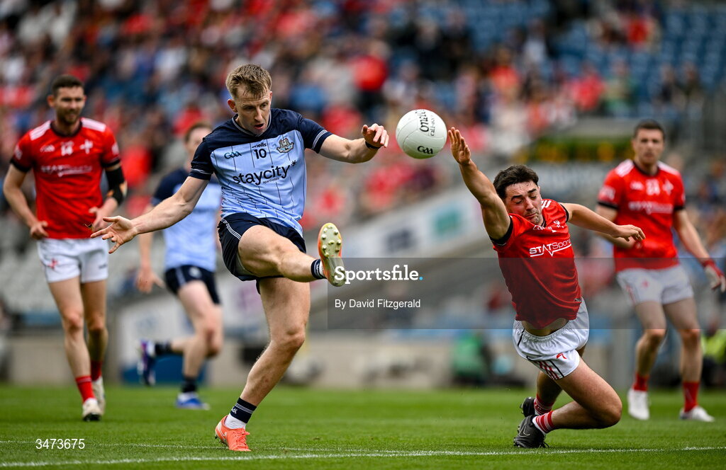 31 May 2026; Seán Bugler of Dublin in action against Emmett Carolan of Louth during the GAA Football All-Ireland Senior Championship Round 1 match between Dublin and Louth at Croke Park in Dublin. Photo by David Fitzgerald/Sportsfile