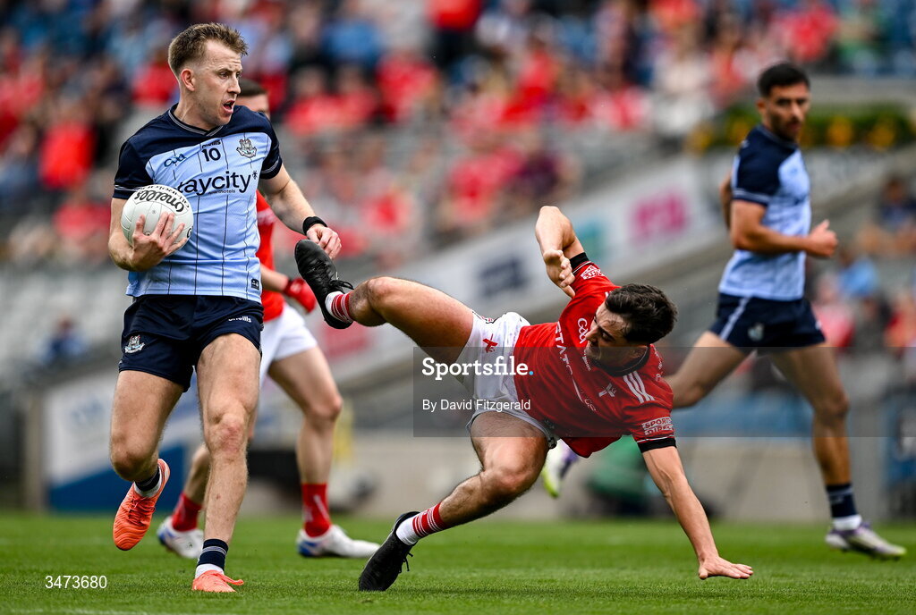 31 May 2026; Seán Bugler of Dublin in action against Emmett Carolan of Louth during the GAA Football All-Ireland Senior Championship Round 1 match between Dublin and Louth at Croke Park in Dublin. Photo by David Fitzgerald/Sportsfile