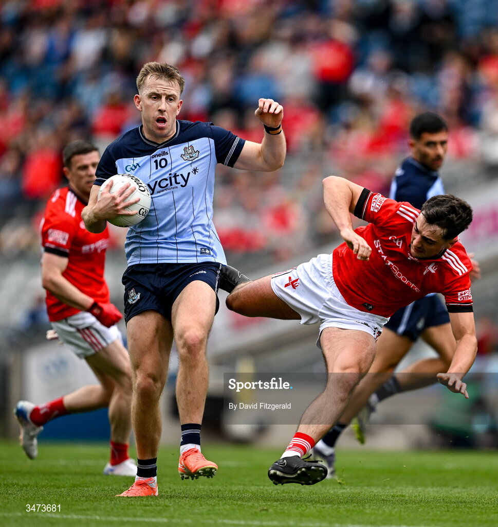 31 May 2026; Seán Bugler of Dublin in action against Emmett Carolan of Louth during the GAA Football All-Ireland Senior Championship Round 1 match between Dublin and Louth at Croke Park in Dublin. Photo by David Fitzgerald/Sportsfile